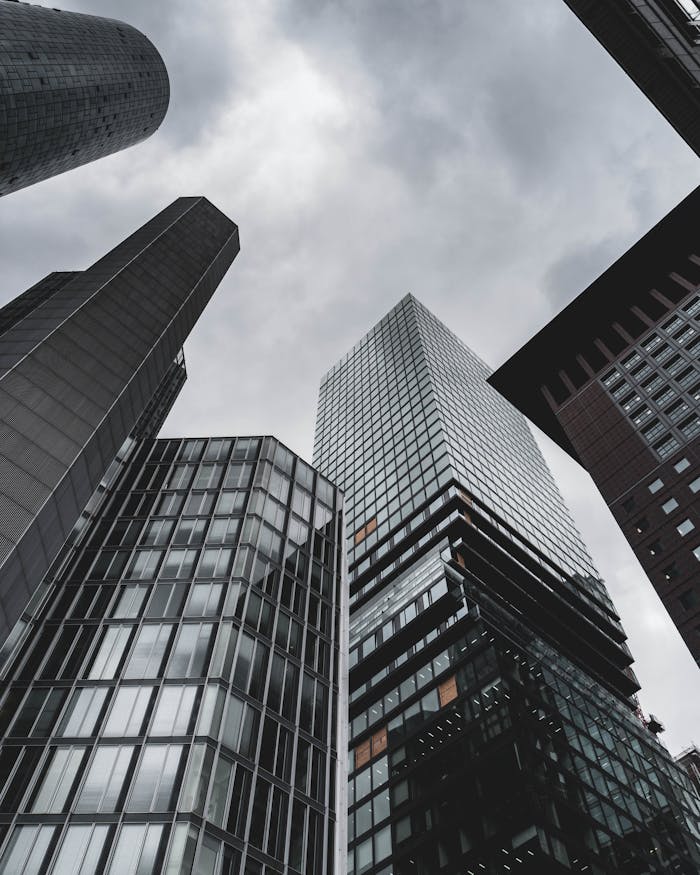 Low-angle view of sleek, modern skyscrapers in Frankfurt, Germany's financial district.